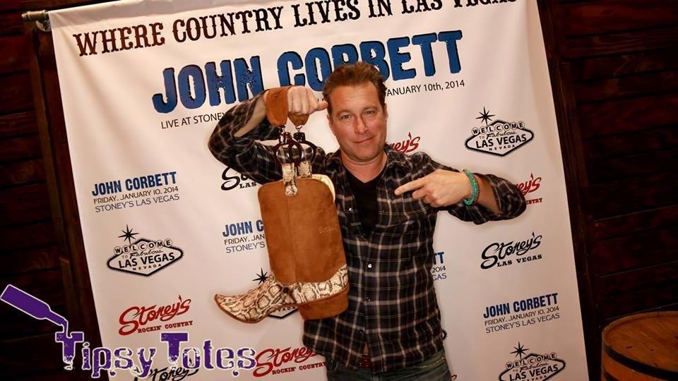 Wine Gifts Maker Gives John Corbett the Booze Boot - Tipsy Totes | Wine Gifts | Beer Koozies | Wine Totes | Simply Fabulous